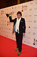  Stephen Rea holding his IFTA Award aloft. The actor won the accolade for Best Supporting Actor Drama for his performance in The Honourable Woman