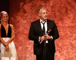 Baz Ashmawy accepting the IFTA Award as 50 Ways To Kill Your Mammy wins for Entertainment