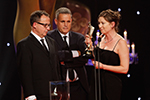 Love/Hate wins Best Drama sponsored by the BAI. Accepted by Steve Matthews (left), James Flynn (centre) and Suzanne McAuley (right, holding the statuette)
 