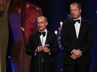 Ed Guiney and Andrew Lowe of Room accept the award for Best Film