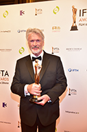 Actor Patrick Bergin who accepted the Best Director Film IFTA Award on behalf of Lenny Abrahamson who won for Frank